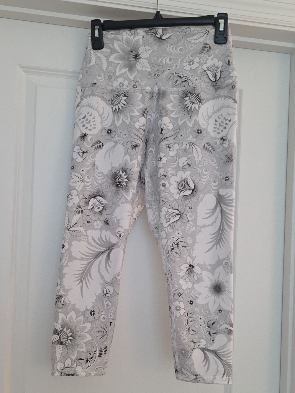 Evolution and Creation Gray, White, And Black Floral Women's Capri Leggings